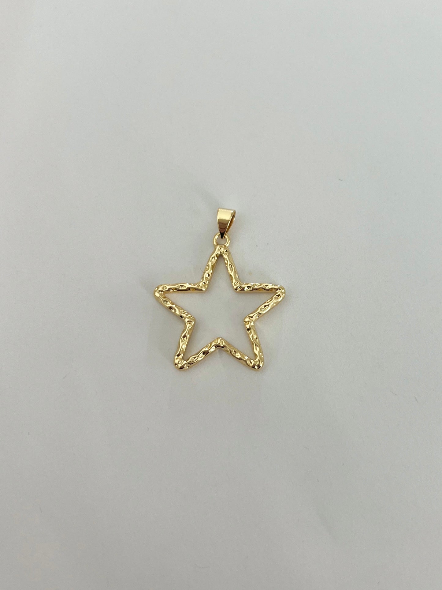 Hollow Star Charm